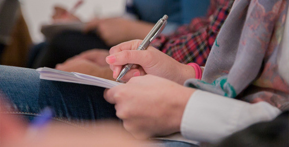 Female Hand Taking Notes