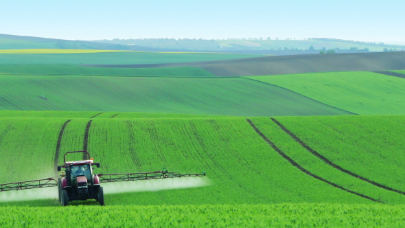 Tractor Watering the Field