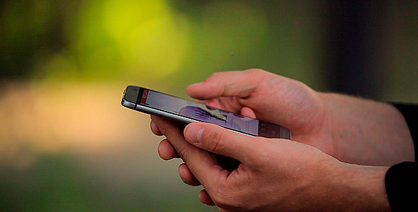 The Man With the Phone in the Park