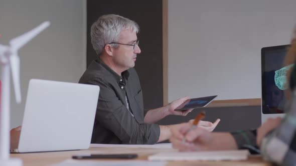 Caucasian man working in creative office