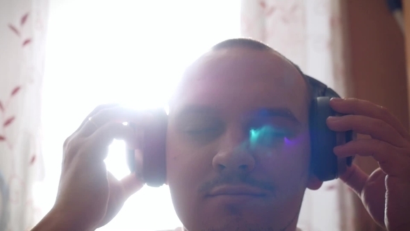 Slowmotion Of Young Smiles Man Listen To Music