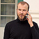 Man Walking and Talking on the Phone in Residence - VideoHive Item for Sale