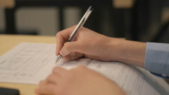 Working man Signing Documents