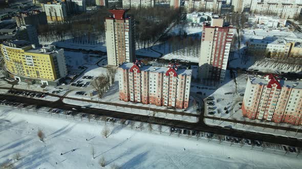 City quarters. Multi-story houses. Winter cityscape.