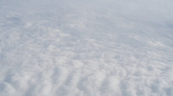 Aerial View from Airplane - Soft Clouds