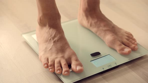 Walking Male Checking BMI Weight Loss. Human Barefoot Measuring Body Fat Overweight.