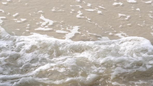 Gentle wave on the beach. 