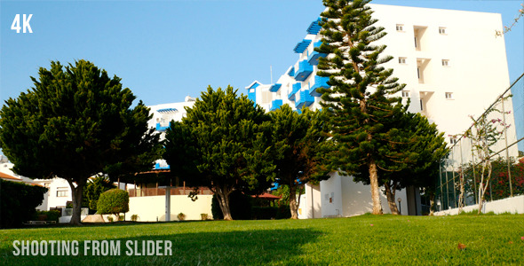 Green Grass And White Building 