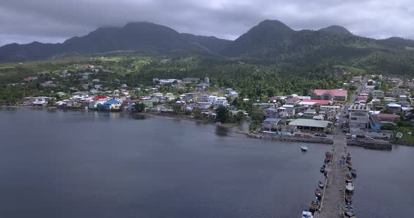 Aerial View Of The City Of Portsmouth And The Beautiful Scenery Of The Dominica Mountains