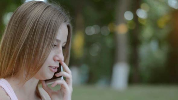 Pretty Girl Talking on Phone alt