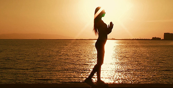 Woman Relaxing at Sunset