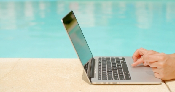 Woman Using Her Laptop Computer alt