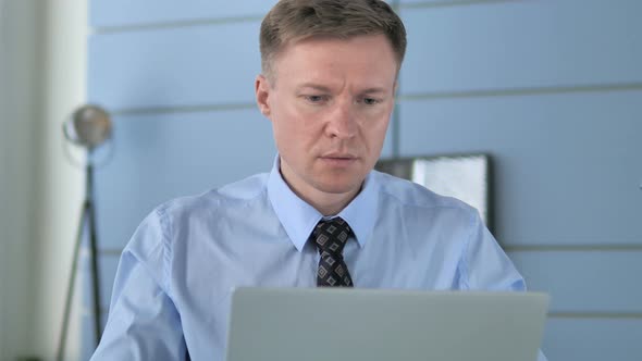 Close Up of Working Businessman 