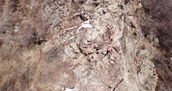 A Group of People are Engaged in Rock Climbing