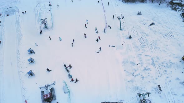 Skiers and Snowboarders Skiing on