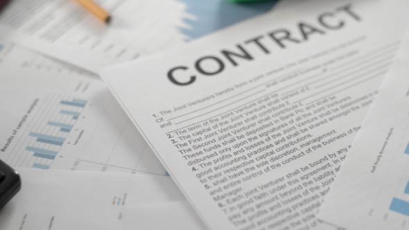Contract and Documents on  Table