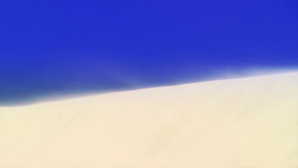 Wind Blowing On Sand Dune