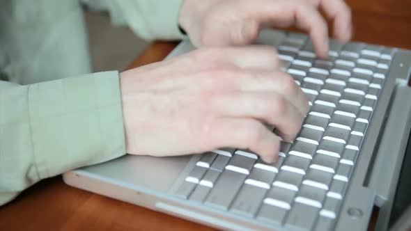 Man Typing On Laptop Computer, Time Lapse alt