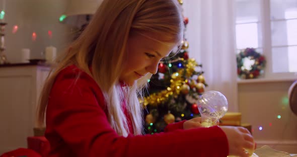 Girl at home at Christmas time 4k