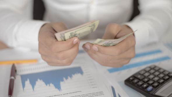 Businessman Counting Money