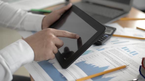 Businessman using Tablet PC 