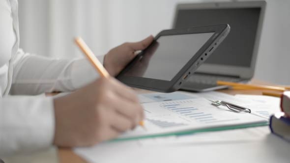 Businessman Working by Using Tablet PC