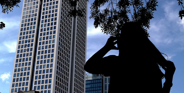 Business Woman Silhouette Talking with Cellphone