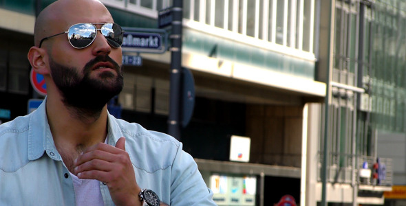 Man Wearing Glasses and City alt