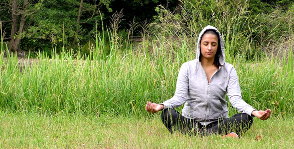 Young Girl Meditation Spirit Concept in Nature