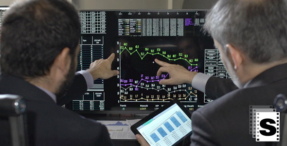  Traders Analysing Stock Market alt