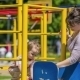 Cute Baby Boy On a Slide In Playground - VideoHive Item for Sale