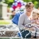 Mother And Baby Enjoying Fountains In The Park - VideoHive Item for Sale