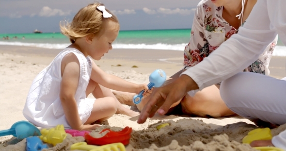 Grandma Mum And Daughter On The Beach