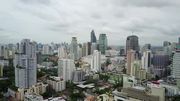 Bangkok, Thailand - Modern High-rise Building Structures Under The Cloudy Sky In Sukhumvit - Aerial