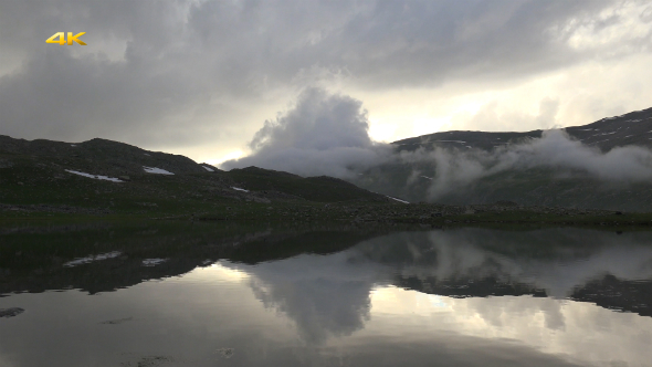 Mountain Lake Above the Clouds in the Morning