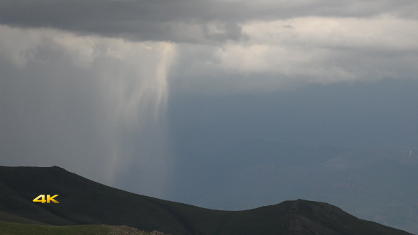Precipitation Falling from the Storm Clouds alt