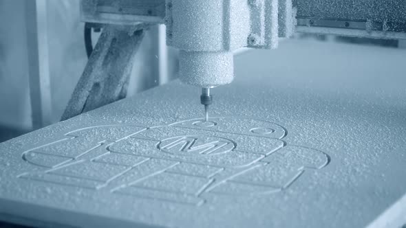 Milling Machine Carves the Form on a White Surface Closeup