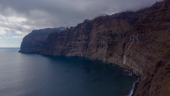 Aerial Hyperlapse of Los Gigantes Cliffs on Tenerife Overcast Canary Islands Spain