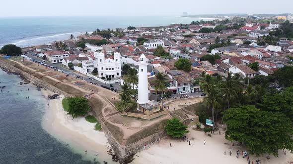 Aerial Footage of White Lighthouse in Galle Fort, Sri Lanka