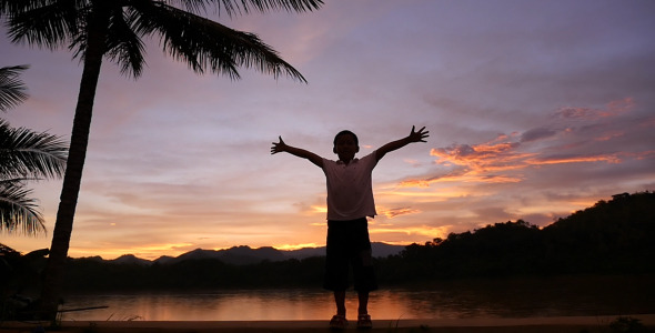 Boy At Sunset