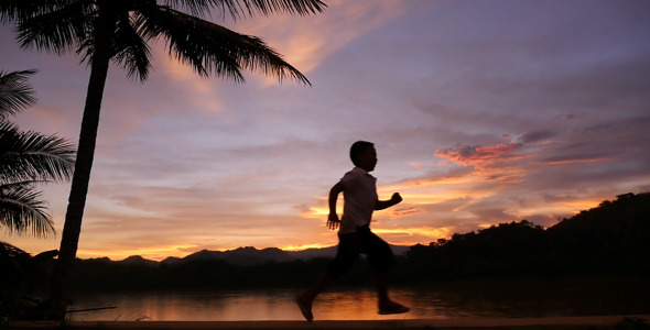 Kid Running In The Sunset