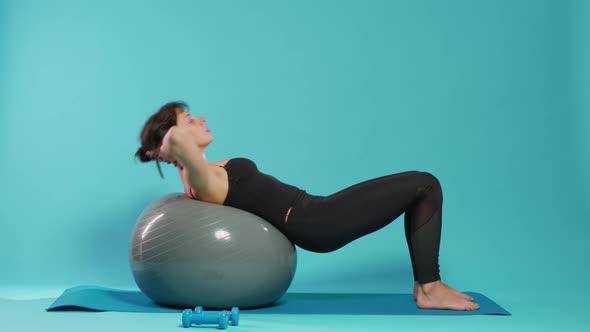 Athletic Person Doing Physical Effort on Fitness Toning Ball