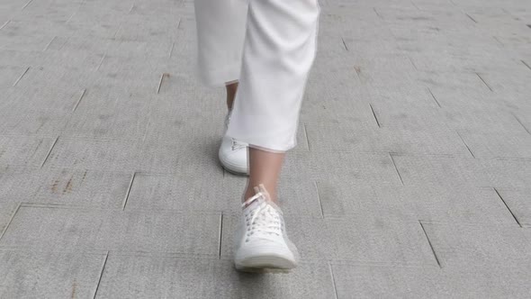 Walking Legs of Casual Woman in Shorts