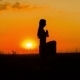 Silhouette Of a Young Girl Practicing Yoga  At - VideoHive Item for Sale