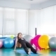 Young Woman Relaxing By Doing Stretching Exercises - VideoHive Item for Sale