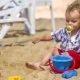 Mother And Baby Playing With Toys In Sand  - VideoHive Item for Sale