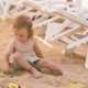 Little Boy Plays With Toys In Sand  - VideoHive Item for Sale