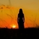 Silhouette Of a Young Woman Practicing Yoga  At - VideoHive Item for Sale