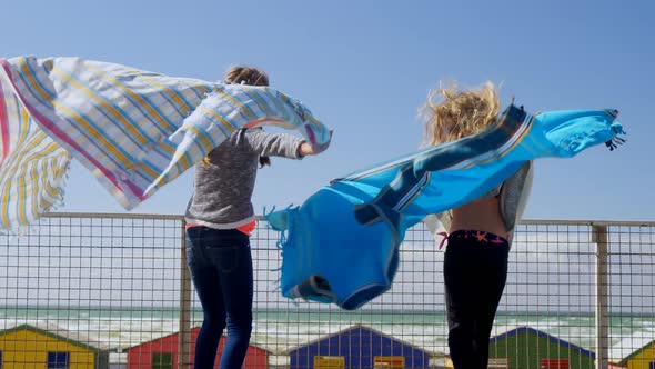 Siblings having fun near beach