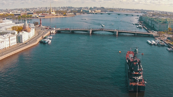 Aerial View Warship Moored in City alt